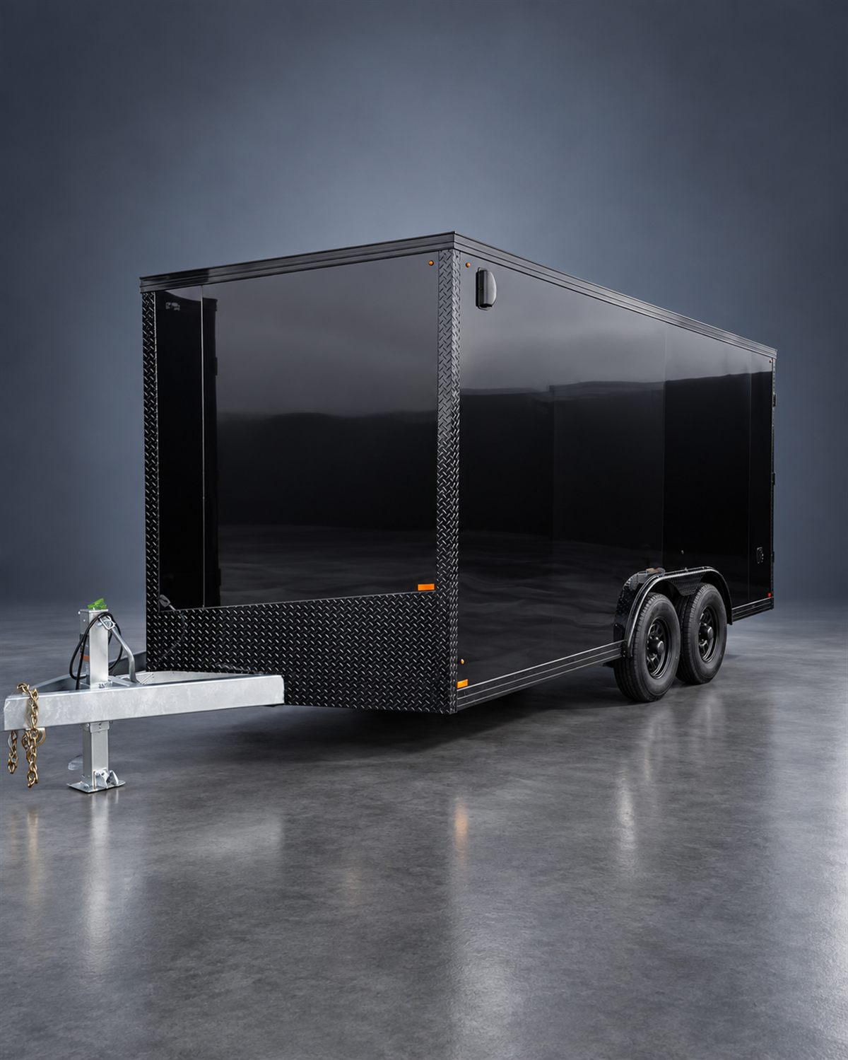 Black enclosed tandem-axle trailer with galvanized hitch against an edited studio background